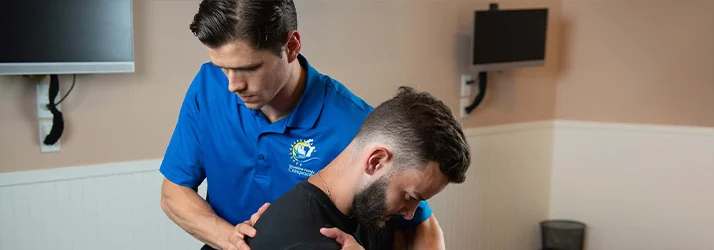 Chiropractor Milford CT CJ Cameron Adjusting Patient Chiropractor Milford CT CJ Cameron Adjusting Patient