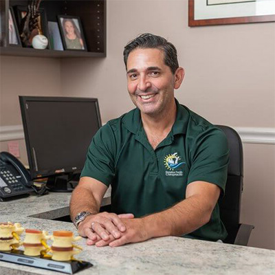 Chiropractor Milford CT Matthew Paterna At Desk