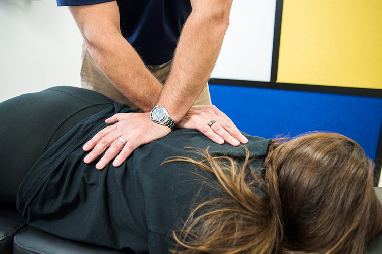 Chiropractor Milford CT Matthew Paterna Adjusting Patient What To Expect