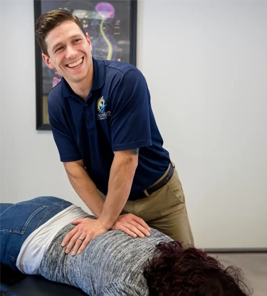 Chiropractor Milford CT CJ Cameron with Patient Chiropractor Milford CT CJ Cameron with Patient